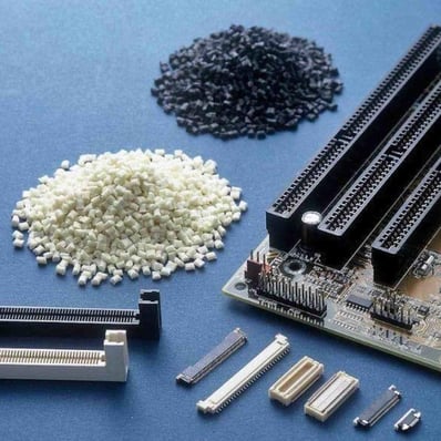 black and white purging compounds next to electric circuit parts