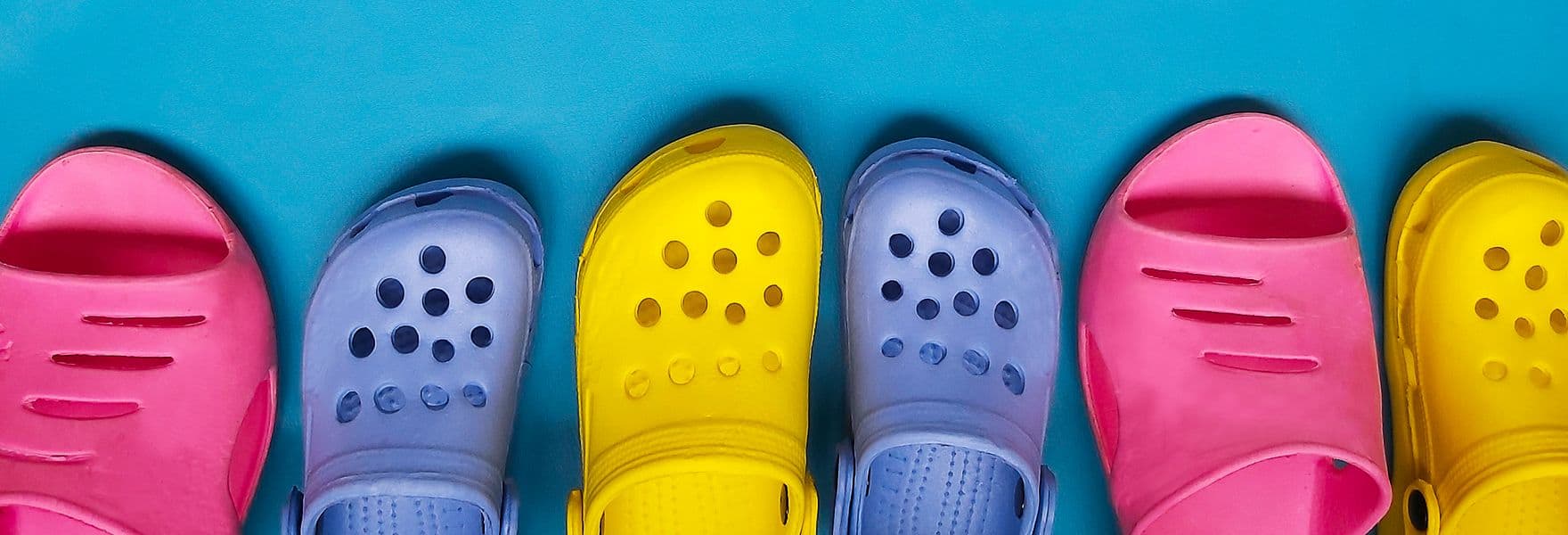 Colorful Crocs in a row